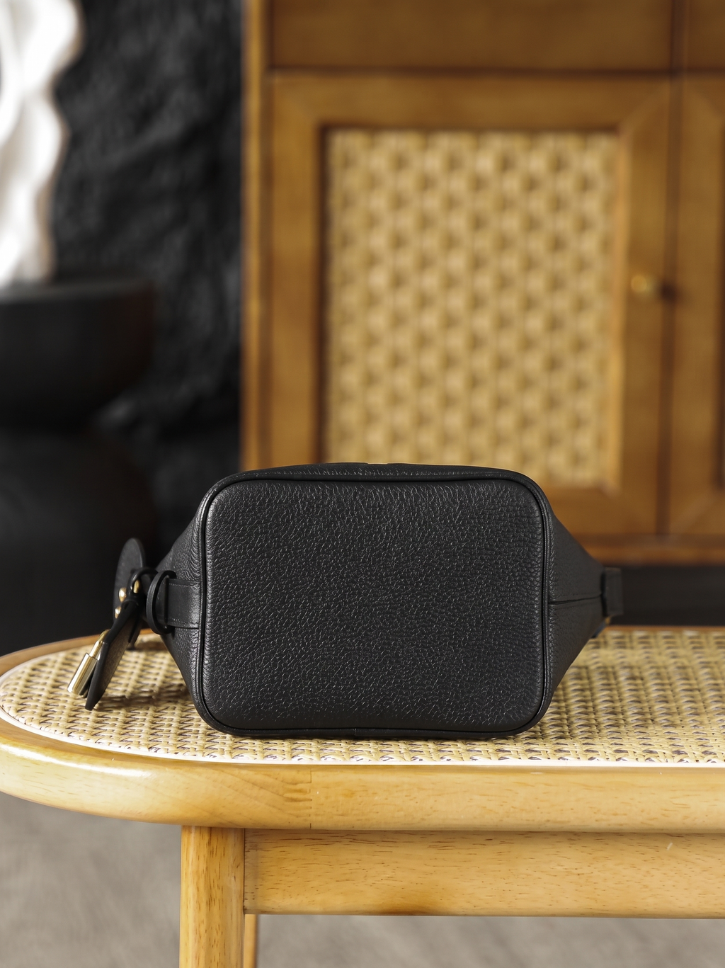 Embossed Monogram Handbag in Black Leather