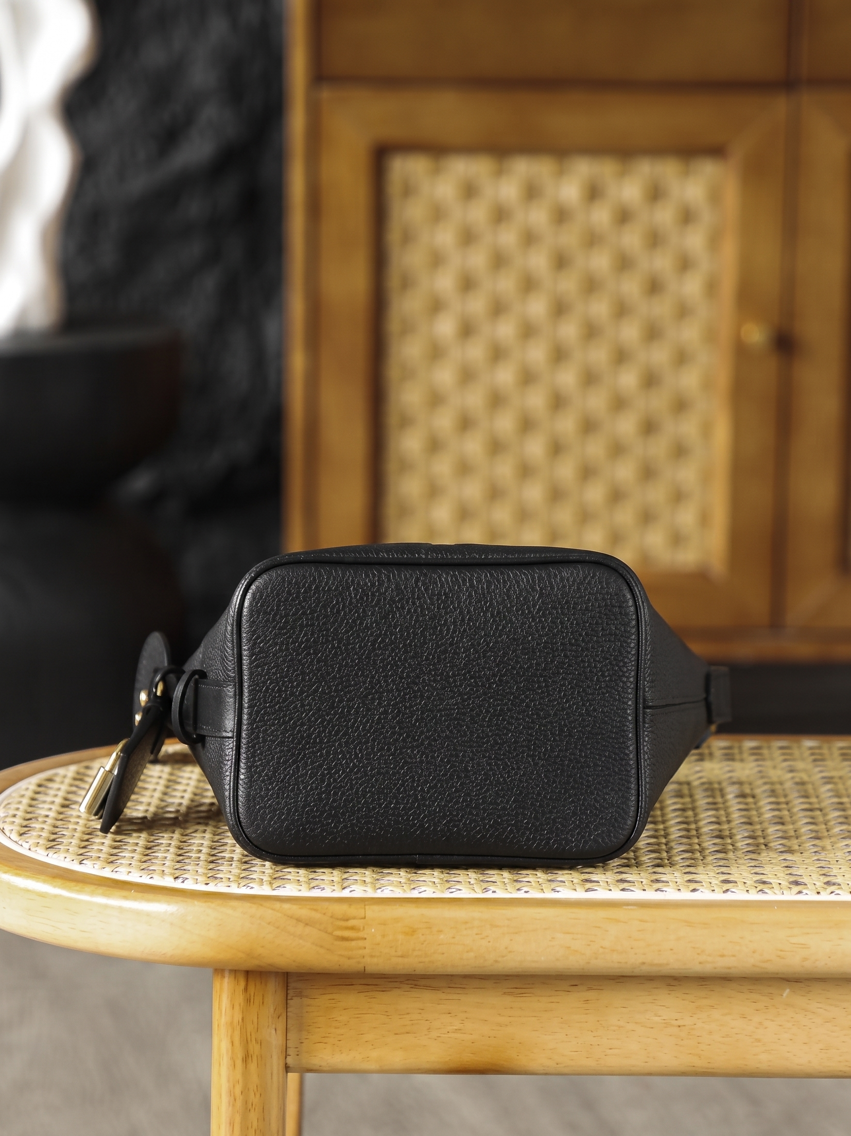 Embossed Monogram Handbag in Black Leather