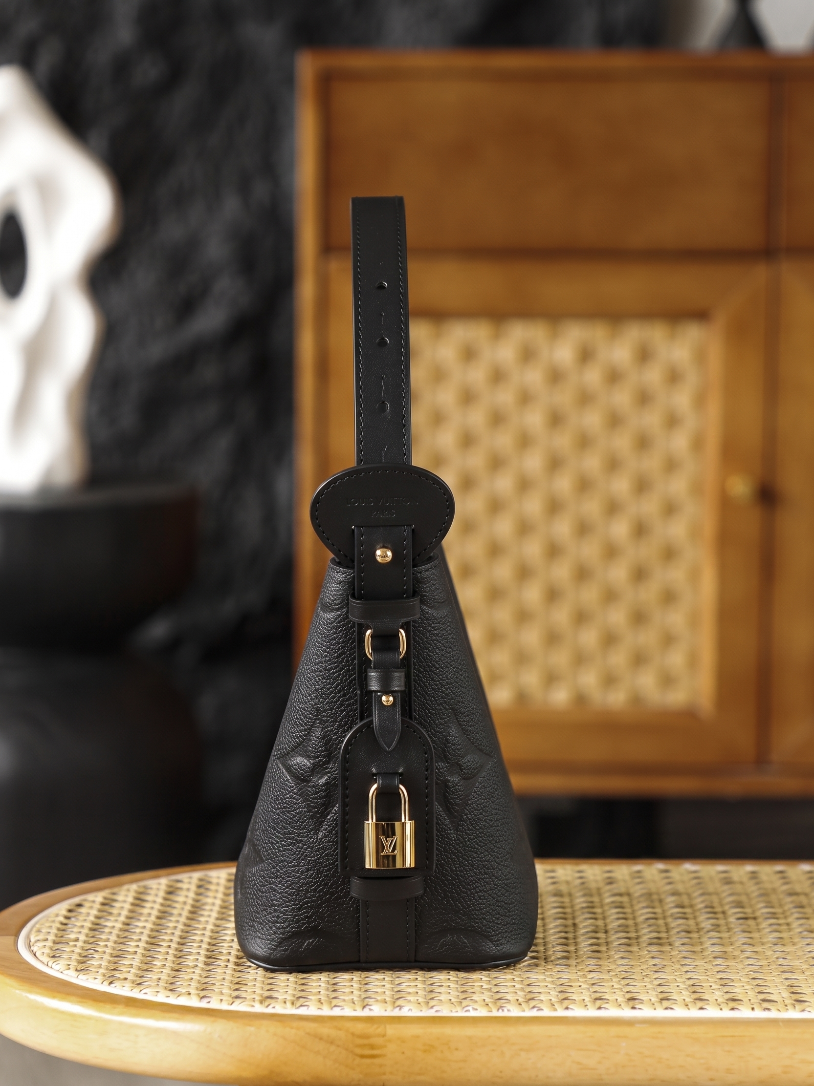 Embossed Monogram Handbag in Black Leather