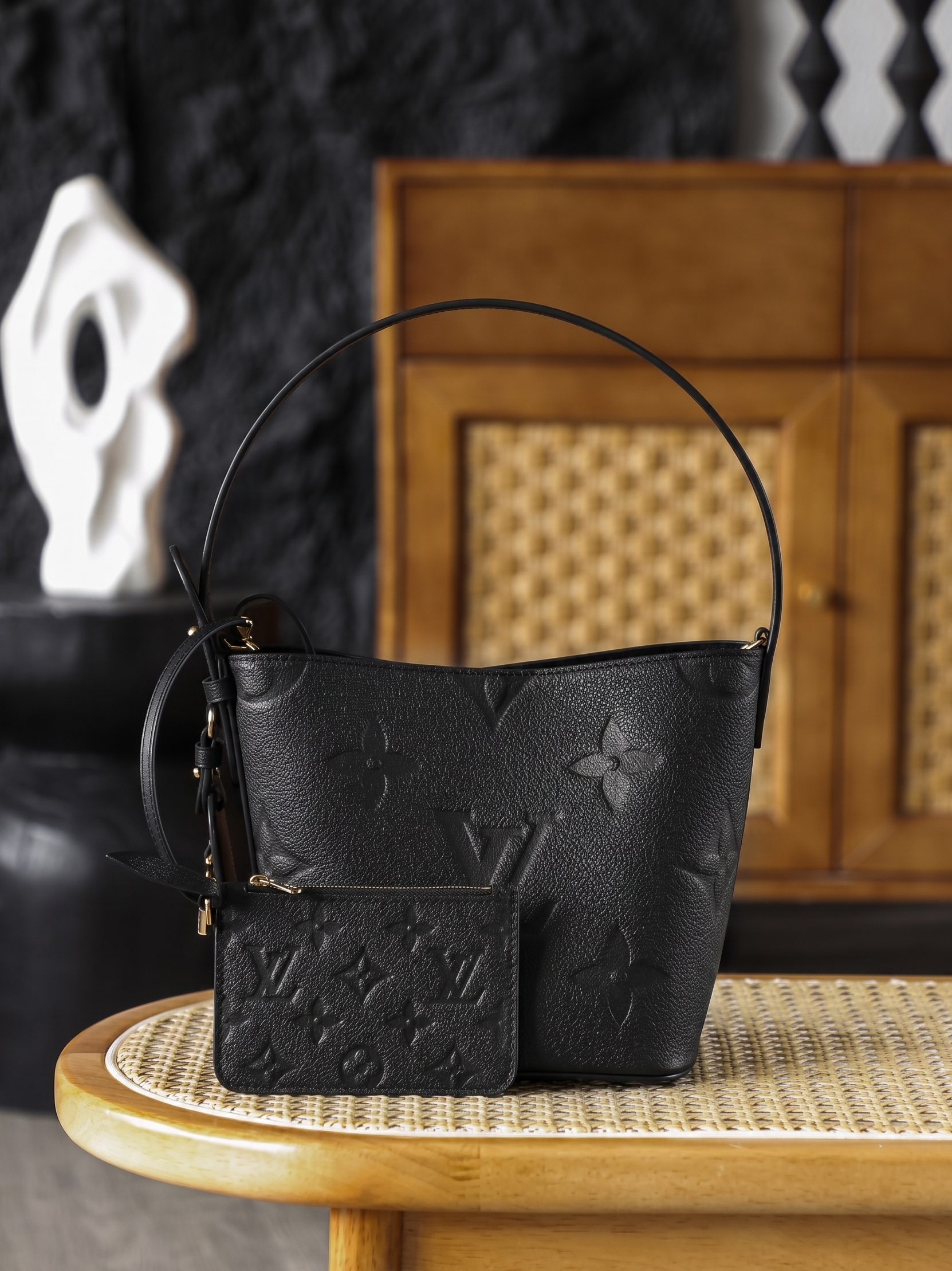 Embossed Monogram Handbag in Black Leather